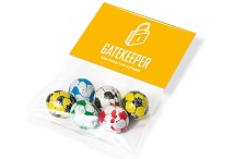 Chocolate footballs in an info card pack