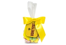 Chocolate speckled eggs in a swing tag bag