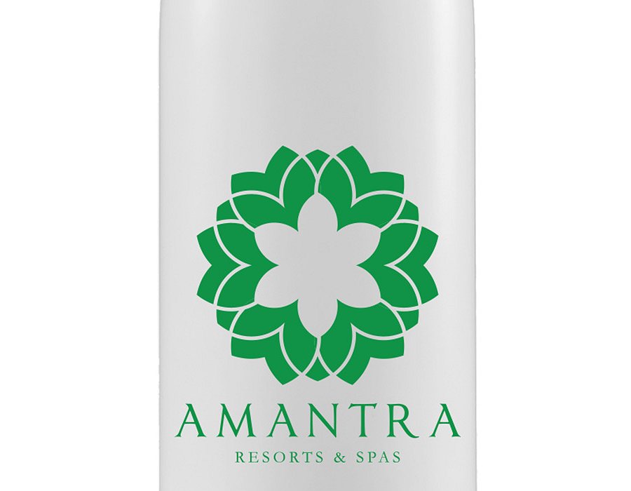 White bottle with green printed logo